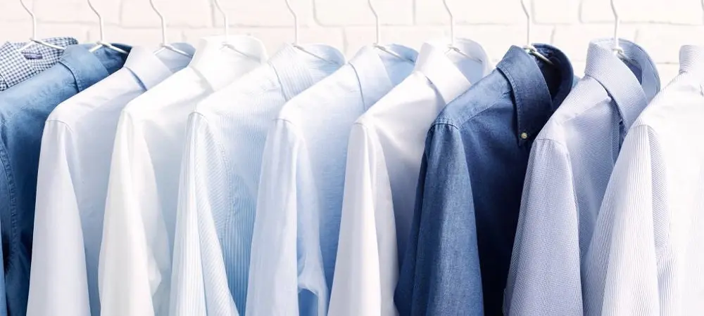 Men's woven shirts on hangers