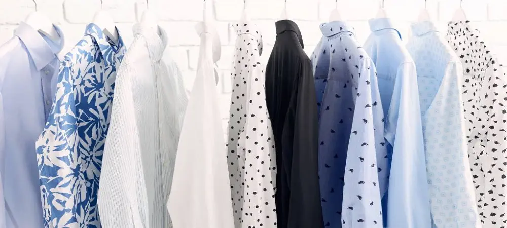 Women's woven shirts on hangers
